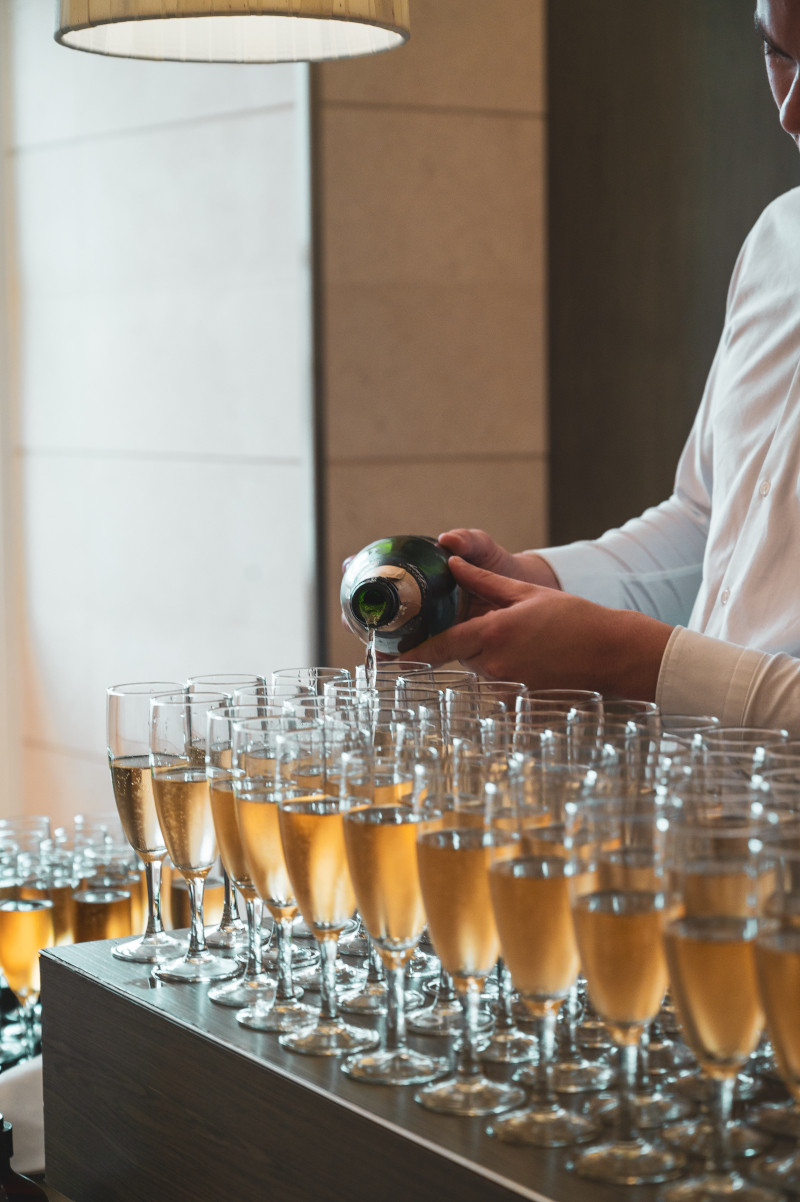 Waiter Pouring Champagne